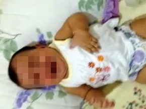 Bebê de seis meses chora após tentativa de sufocamento.(Imagem:Polícia Civil/Divulgação)