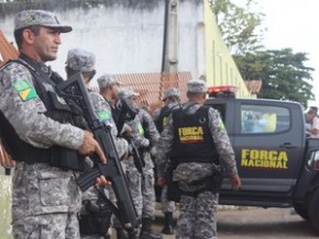 Polícia montou barreira e manteve segurança reforçada na penitenciária.(Imagem:Fernando Brito/G1)