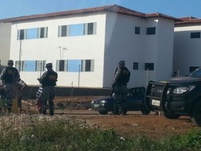 Policiais da Força Nacional no cumprimento da reintegração de posse.(Imagem:Patrícia Andrade/G1)