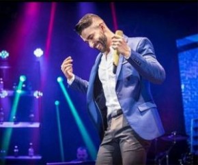 Gusttavo Lima doa R$ 12 mil para tratamento de garoto durante show em Brasília.(Imagem:Folha Press)