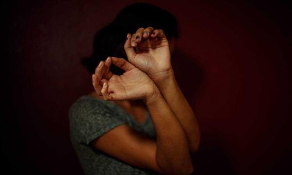 Vítima de violência doméstica na Baixada Fluminense (RJ).(Imagem:Daniel Marenco/Agência O Globo)
