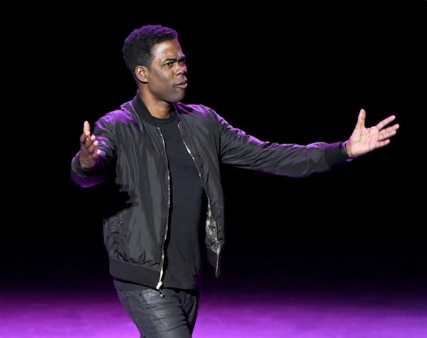 O ator Chris Rock durante apresentação de espetáculo stand-up.(Imagem:Getty Images)