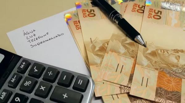 Negocia&ccedil;&atilde;o de d&iacute;vida.(Imagem:Marcos Santos/USP Imagens)