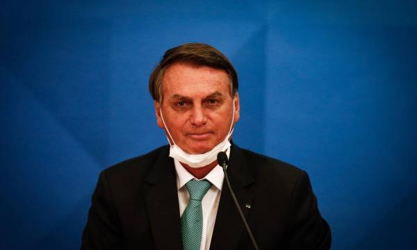 O presidente Jair Bolsonaro falou sobre aplicação do spray nasal para casos graves de Covid-19 em março de 2021.(Imagem:Pablo Jacob/Agência O Globo)