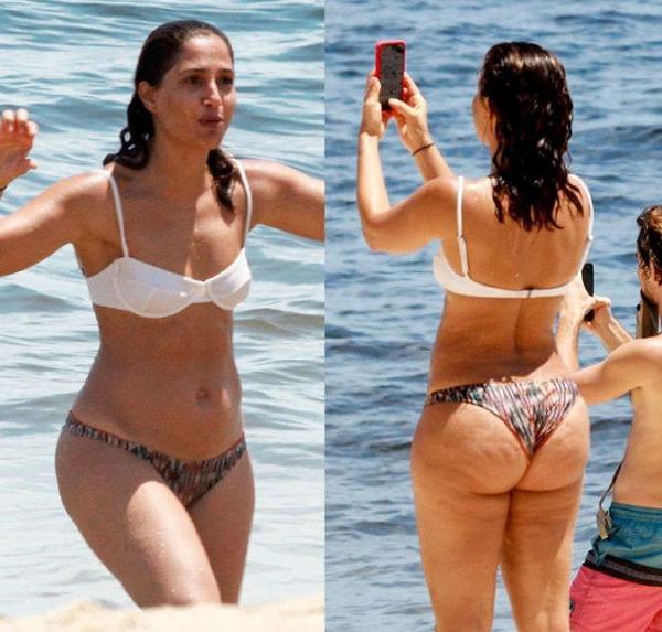 Beleza natural! Camila Pitanga foi flagrada tomando banho de mar na praia do Rio de Janeiro, na última terça-feira, dia 14, e exibiu o corpão sem retoques aos 44 anos de idade.  Pa(Imagem:Reprodução)